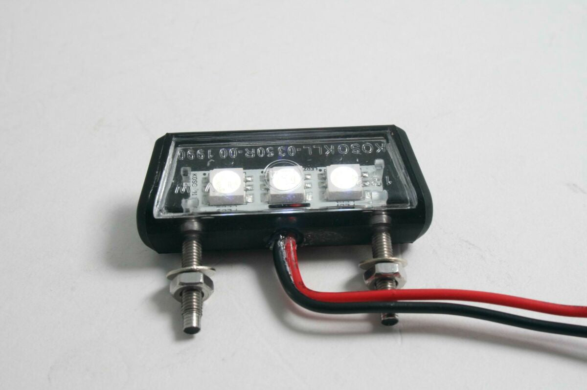 Skiltholder og skiltlys, LED License Plate Light / Clear Lens / Black — Parts Europe 20301076